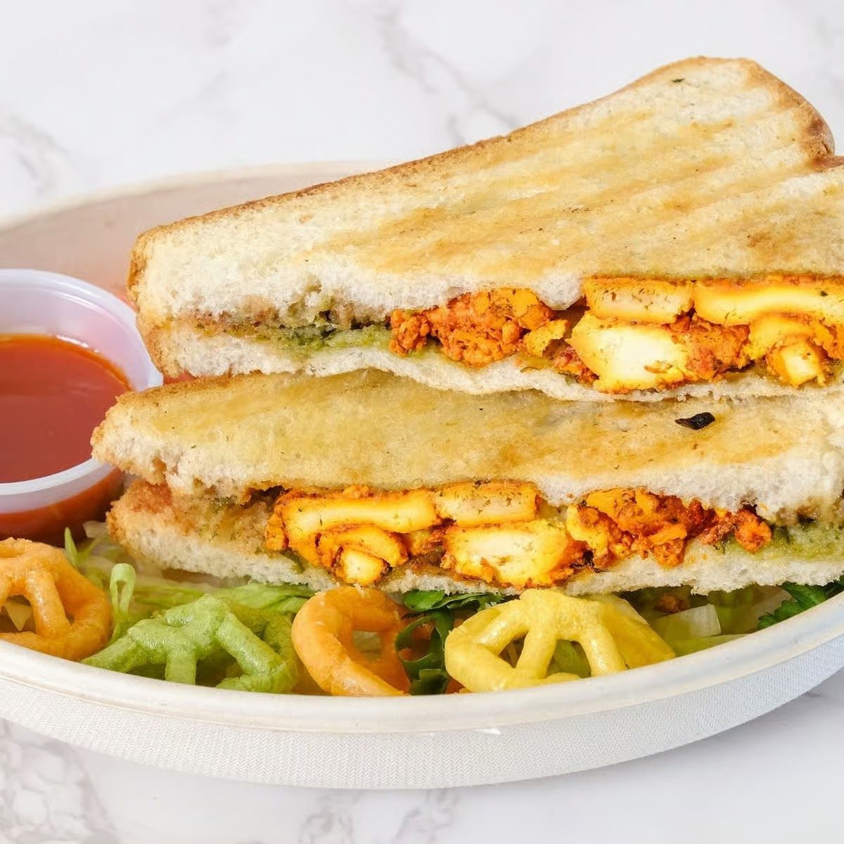Paneer Schezwan Sandwich.